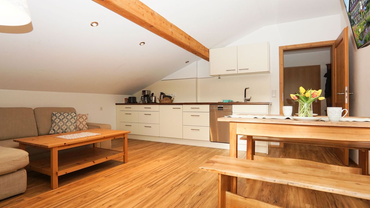 Wohnbereich mit Küche Wohnbereich mit Küche